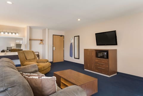 Blackout drapes, iron/ironing board, rollaway beds, free WiFi