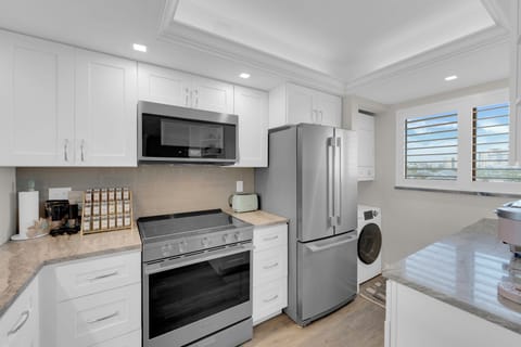 Updated kitchen in your weekly vacation rental at Carlos Pointe 426