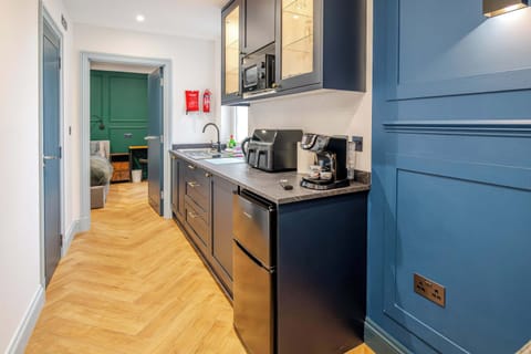 The kitchen has everything you could possibly need for your stay, including utensils, kettle, toaster, fridge, microwave and hob. Please note there is no oven.