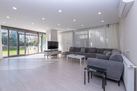 Deluxe Apartment, 2 Bedrooms, 2 Bathrooms, Ground Floor | Living area | 43-inch TV with satellite channels