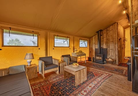 Living area with a log burner for the perfect family gathering