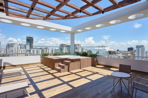 Luxury Apartment, City View | Outdoor spa tub