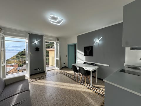 Panoramic Suite, Multiple Beds, Balcony, Sea View | Living area | 32-inch LED TV with cable channels