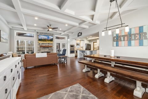 The living room has seating, a gas fireplace, and access to the patio! 