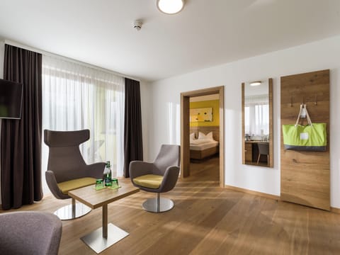 Suite, Balcony, Mountain View | Minibar, in-room safe, desk, blackout drapes