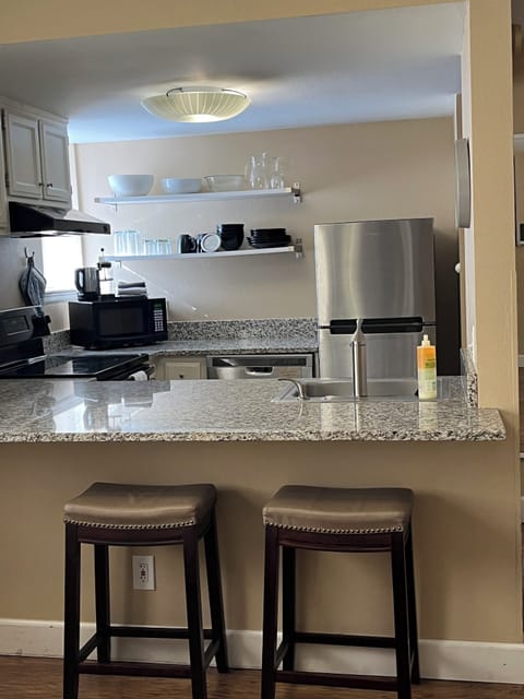 Kitchen from bed and sitting area
