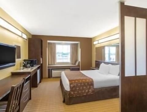 Pillowtop beds, desk, blackout drapes, iron/ironing board