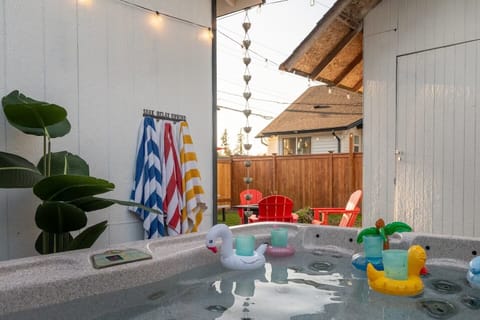 Soak, relax, and step out to a cozy patio—your spa day starts here.