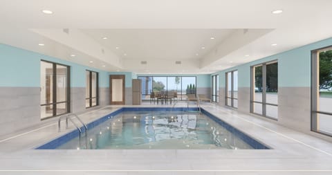 Indoor pool, open 5:00 AM to 10:00 PM, sun loungers