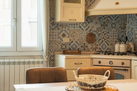 Comfort Apartment, Balcony, City View | Private kitchen | Full-size fridge, oven, stovetop, dishwasher