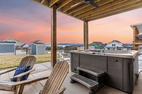 Jump in the hot tub after getting out of the community pool steps away!