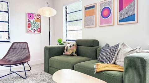 A relaxed, boho-style living room made for unwinding, lounging, and easing into vacation mode.