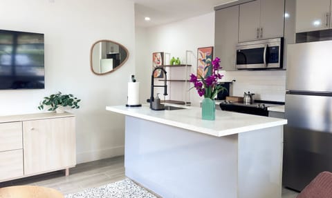 Pull up a barstool at the island for morning coffee, casual meals, or keeping the cook company.