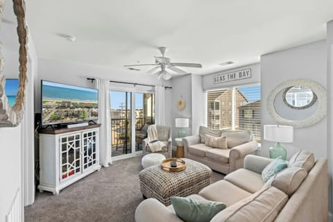 This comfy living room offers space for everyone to gather!