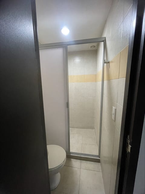 Basic Quadruple Room | Bathroom | Shower, towels, shampoo, toilet paper