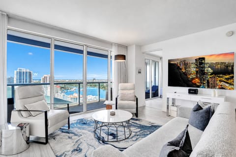 Living area with ocean and city views from every seat.