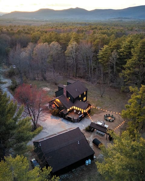 Set on a peaceful wooded lot, the property offers privacy, natural beauty, and true mountain escape feel.  String lights glow at dusk, snow blankets the landscape in winter, and the entire backyard transforms into a cozy retreat.