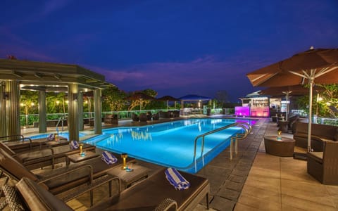 Outdoor pool, open 8:00 AM to 8:00 PM, pool umbrellas, sun loungers