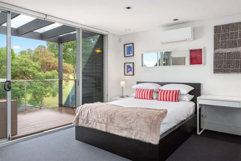 Overlooking secluded parkland and city skyline.