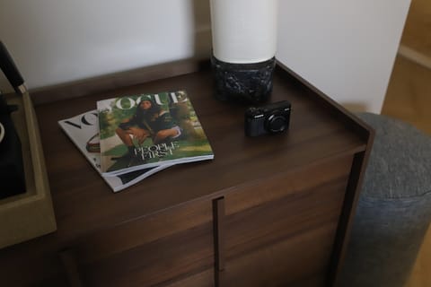 A warm welcome with curated books and calming decor — simple, clean, and stylish.