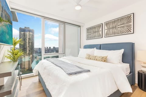 Relax in the cozy bedroom featuring a comfortable king bed