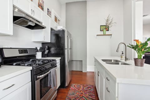 Kitchen- Island w/seating, stainless steel appliances, coffee products provided