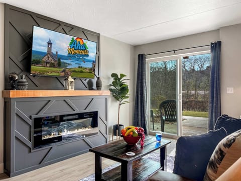 Beautiful living area with access to the patio right on Roark Creek