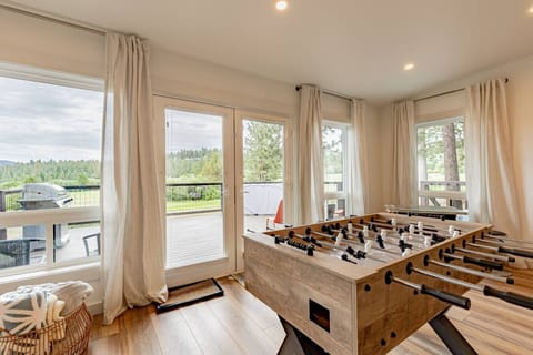 Bright Game room with huge windows and view of the Golf Course