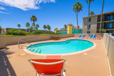 Relax and unwind at the sparkling pool, complete with lounge chairs and a picnic table for poolside dining. Perfect for soaking up the sun, cooling off with a swim, or enjoying a laid-back afternoon during your South Padre Island getaway.