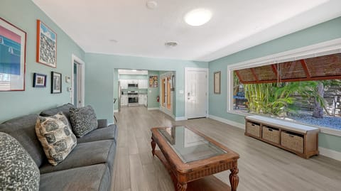 Soft seating and natural light create the perfect place to gather for movies, morning coffee, or simple downtime.