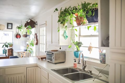 Full kitchen with oven, stove, microwave, dishwasher, toaster oven, and pour‑over coffee setup—fuel your adventures and artistry.