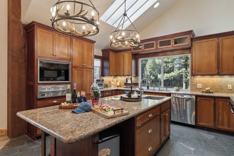 Fully stocked kitchen with reliable appliances and utensils.