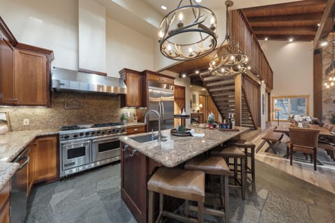 An entertainer’s dream—this bright, lodge-style kitchen connects seamlessly to the dining area, making meals and memories effortless for your whole crew.