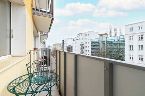 The balcony provides a perfect spot for enjoying the fresh air.