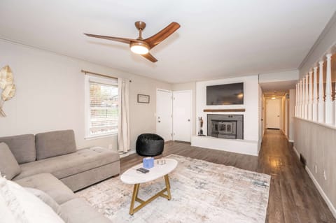 Get cozy on the large couch, enjoy the Smart TV & sip at the table for two!