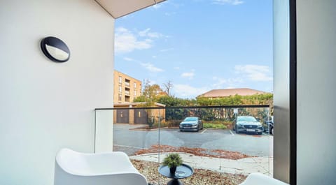 Private balcony with outdoor seating and view