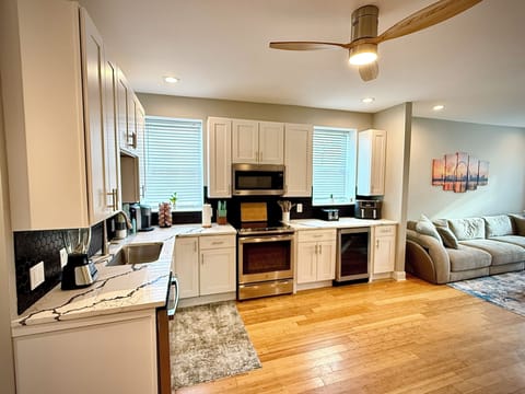 All major appliances including Kuerig, Airfryer, baking items, and a wine fridge