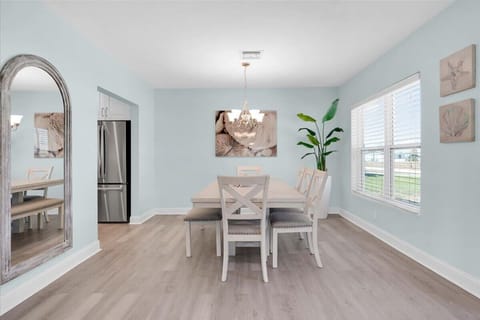 Enjoy your meals in the comfort of the dining area or by the pool.