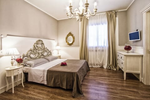 Luxury Triple Room, Pool View | Blackout drapes, iron/ironing board, free WiFi