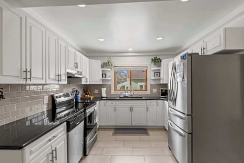 Fully equipped kitchen with natural light.
