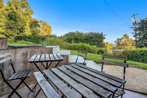 Whether it’s breakfast or a sunset glass of wine, this hillside patio is ready for you.