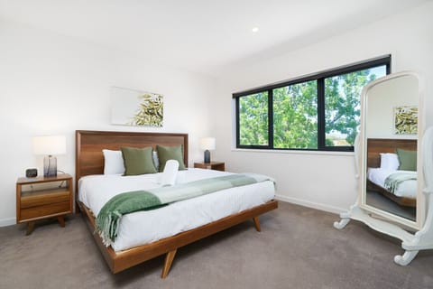 Unwind and recharge in this light-filled bedroom, designed for deep rest and calm mornings.