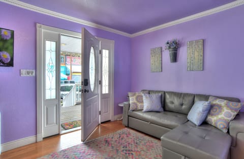 Welcome to the Rose Garden Retreat! - Our living room offers a Smart TV and is open to the dining area. Located across the street from Kip's Grill.