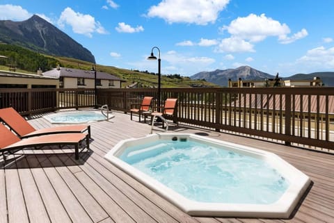 Outdoor hot tubs with relaxing mountain views