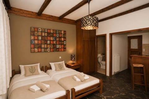 Warm, traditional mountain-style bedroom designed for deep rest after a day in nature.