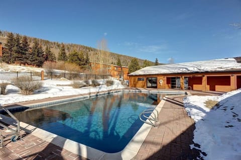 Relax in the outdoor pool while taking in the beautiful views of the snow-capped peaks and lush forest that define the Keystone area.