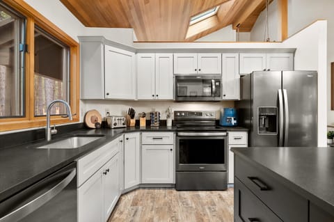 Whip up a feast, pour a mimosa, or just admire how good you look under that perfect kitchen lighting. Fully stocked and totally Instagrammable — this is your culinary playground!