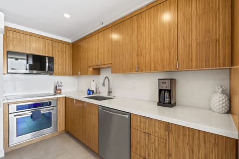 Condo, Multiple Beds, Balcony, Garden View (Mana Kai 304) | Private kitchen | Coffee/tea maker, dining tables