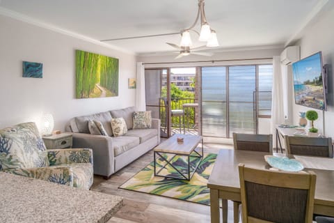 Condo, 1 King Bed with Sofa bed, Balcony, Partial Ocean View (Kihei Akahi C-411) | Living area | 42-inch flat-screen TV with digital channels