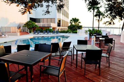 Sip cocktails poolside and linger on the breezy deck.